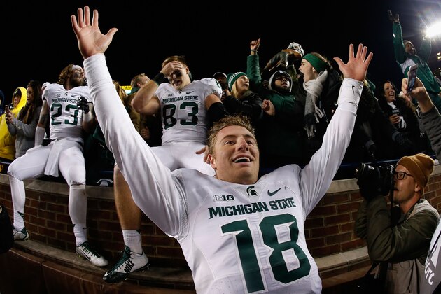 ANN ARBOR, MI - OCTOBER 17:  Quarterback Connor Cook #18 of the Michigan State Spartans celebrates after defeating the Michigan Wolverines 27-23 in the college football game at Michigan Stadium on October 17, 2015 in Ann Arbor, Michigan.  (Photo by Christian Petersen/Getty Images)