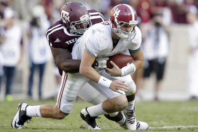 Oct 17, 2015; College Station, TX, USA; Texas A&M Aggies defensive lineman Daylon Mack (5) sacks Alabama Crimson Tide quarterback Jake Coker (14) in the third quarter at Kyle Field. Mandatory Credit: Erich Schlegel-USA TODAY Sports