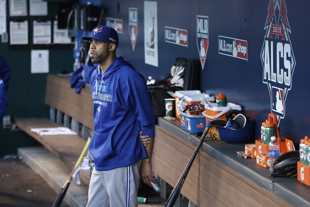 Toronto Blue Jays starting pitcher David Price watches from the dugout during the eighth inning in Game 2 of baseball's American League Championship Series against the Kansas City Royals on Saturday, Oct. 17, 2015, in Kansas City, Mo. (AP Photo/Matt Slocum)
