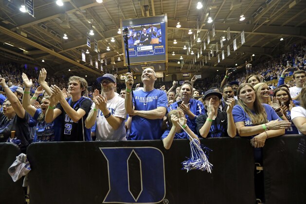 Fans gather to welcome home the national champions Duke basketball team at Cameron Indoor Stadium Tuesday, April 7, 2015 in Durham, N.C. Duke defeated Wisconsin Monday night in the NCAA Final Four tournament championship game. (AP Photo/Gerry Broome)