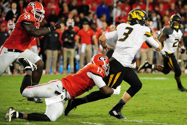 ATHENS, GA - OCTOBER 17: Drew Lock #3 of the Missouri Tigers is sacked by Davin Bellamy #17 of the Georgia Bulldogs on October 17, 2015 in Atlanta, Georgia. Photo by Scott Cunningham/Getty Images)