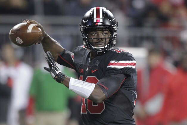 Ohio State quarterback J.T. Barrett drops back to pass against Penn State during the second half of an NCAA college football game Saturday, Oct. 17, 2015, in Columbus, Ohio. Ohio State beat Penn State 38-10. (AP Photo/Jay LaPrete)