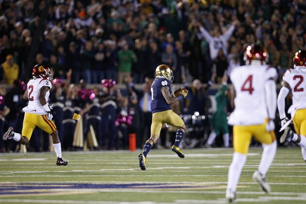 SOUTH BEND, IN - OCTOBER 17: Will Fuller #7 of the Notre Dame Fighting Irish makes a 75-yard touchdown reception behind Adoree' Jackson #2 of the USC Trojans in the first quarter of the game at Notre Dame Stadium on October 17, 2015 in South Bend, Indiana. (Photo by Joe Robbins/Getty Images)