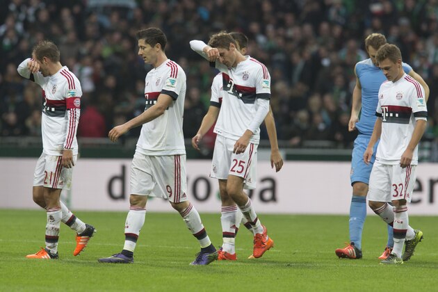 Bayern's Philipp Lahm, Robert Lewandowski, Thomas Mueller, goalkeeper Manuel Neuer and Bayern's Joshua Kimmich, from left, walk from the pitch after the German Bundesliga soccer match between Werder Bremen and FC Bayern Munich in Bremen, Germany, Saturday, Oct. 17, 2015. Bayern won with 1-0. (AP Photo/Joerg Sarbach)