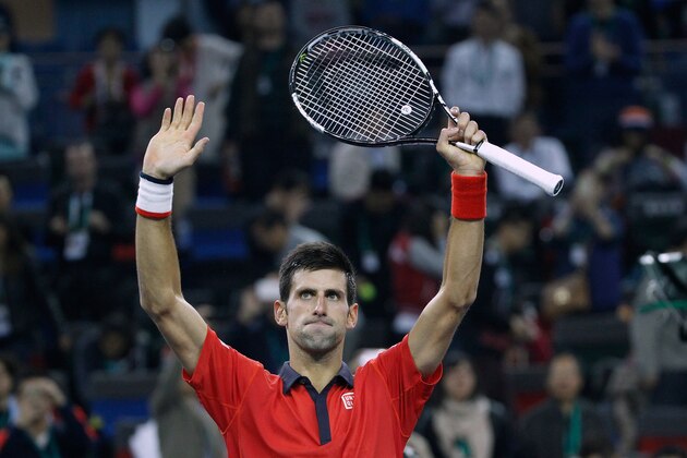 Novak Djokovic of Serbia celebrates after winning his semifinal match against Andy Murray of Britain in the Shanghai Masters tennis tournament in Shanghai, China, Saturday, Oct. 17, 2015. (AP Photo)