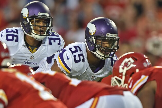 KANSAS CITY, MO - AUGUST 23:  Linebacker Anthony Barr #55 of the Minnesota Vikings gets set on defense against the Kansas City Chiefs during the first half on August 23, 2014 at Arrowhead Stadium in Kansas City, Missouri.  (Photo by Peter G. Aiken/Getty Images)