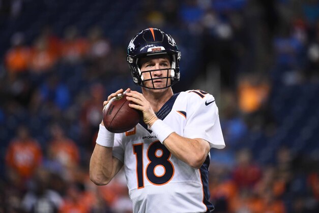 Sep 27, 2015; Detroit, MI, USA; Denver Broncos quarterback Peyton Manning (18) warms up prior to the game against the Detroit Lions at Ford Field. Mandatory Credit: Tim Fuller-USA TODAY Sports