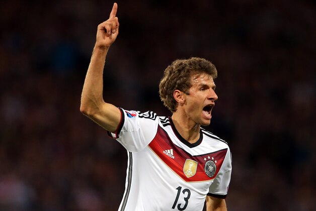 Germany's Thomas Muller celebrates his goal during their Euro 2016 Group D qualifying soccer match at Hampden Park, Glasgow, Scotland, Monday Sept. 7, 2015. (AP Photo/Scott Heppell)