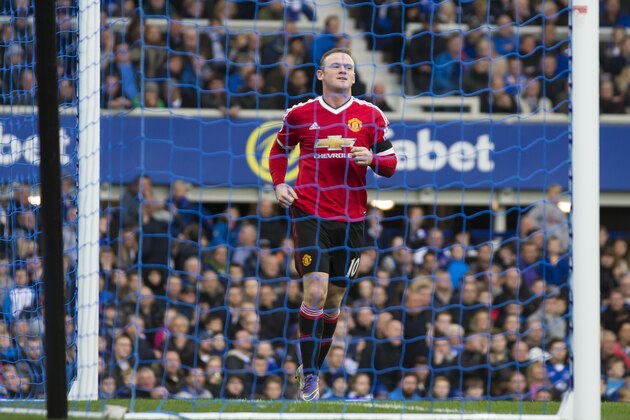 Manchester United's Wayne Rooney celebrates after scoring during the English Premier League soccer match between Everton and Manchester United at Goodison Park Stadium, Liverpool, England, Saturday Oct. 17, 2015. (AP Photo/Jon Super)
