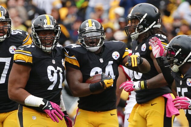 Pittsburgh Steelers inside linebacker Lawrence Timmons (94) celebrates with teammates after making an interception against the Arizona Cardinals in the first quarter of an NFL football game, Sunday, Oct. 18, 2015 in Pittsburgh. (AP Photo/Gene J. Puskar)