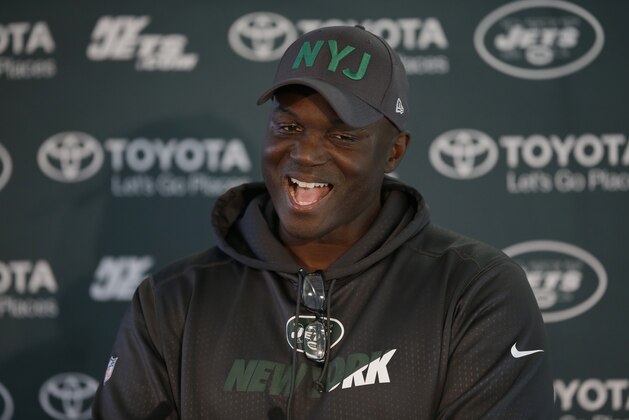 New York Jets head coach Todd Bowles speaks during a press conference after an NFL training session at London Irish training ground in south west London, Friday, Oct. 2, 2015. The New York Jets are preparing for an NFL football game against the Miami Dolphins at London's Wembley stadium on Sunday. (AP Photo/Matt Dunham)