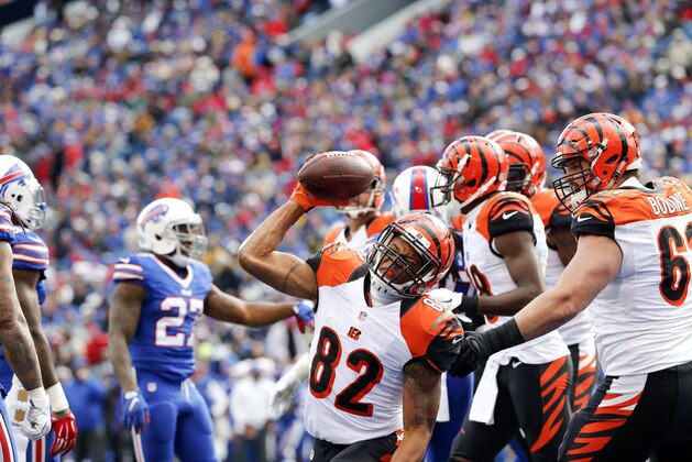 Cincinnati Bengals wide receiver Marvin Jones (82) celebrates his touchdown against the Buffalo Bills during the second half of an NFL football game on Sunday, Oct. 18, 2015, in Orchard Park, N.Y. (AP Photo/Bill Wippert)
