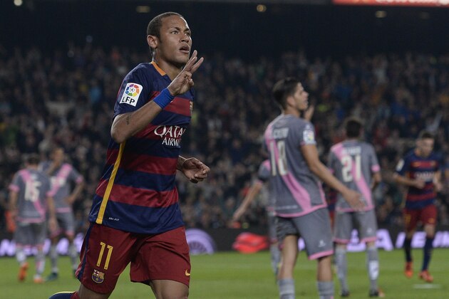 Barcelona's Brazilian forward Neymar da Silva Santos Junior celebrates his goal during the Spanish league football match FC Barcelona vs Rayo Vallecano de Madrid at the Camp Nou stadium in Barcelona on October 17, 2015.   AFP PHOTO/ JOSEP LAGO        (Photo credit should read JOSEP LAGO/AFP/Getty Images)
