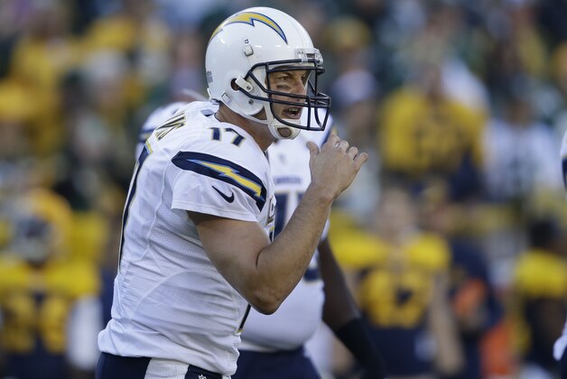 San Diego Chargers quarterback Philip Rivers (17) calls a play during the first half of an NFL football game against the Green Bay Packers, Sunday, Oct. 18, 2015, in Green Bay, Wis. (AP Photo/Jeffrey Phelps)