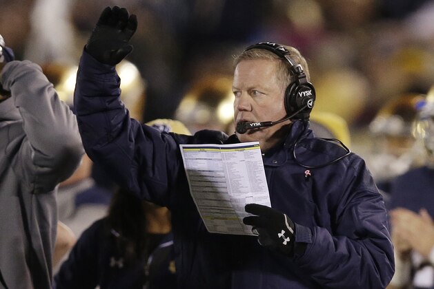 Notre Dame head coach Brain Kelly watches during the second half of an NCAA college football game against Southern California, Saturday, Oct. 17, 2015, in South Bend, Ind. Notre Dame won the game 41-31. (AP Photo/Darron Cummings)
