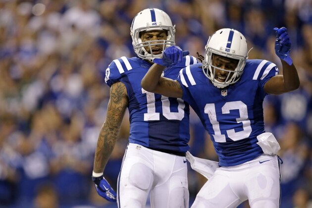 Indianapolis Colts wide receiver Donte Moncrief (10) celebrates a touchdown with wide receiver T.Y. Hilton (13) against the New York Jets in the second half of an NFL football game in Indianapolis, Monday, Sept. 21, 2015. (AP Photo/AJ Mast)