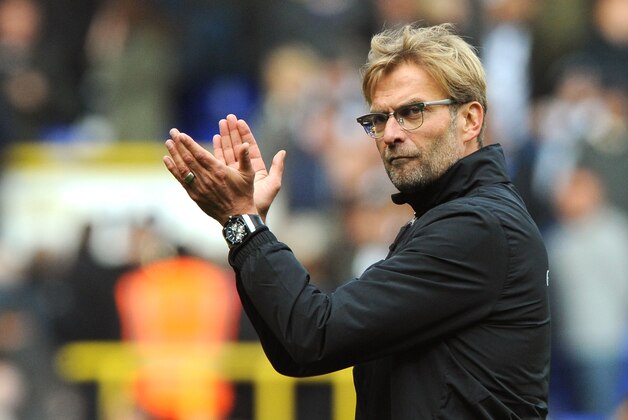 Liverpool manager Juergen Klopp applauds fans during the English Premier League soccer match between Tottenham Hotspur and Liverpool at the White Hart Lane, London, England, Saturday, Oct. 17, 2015. (AP Photo/Rui Vieira)