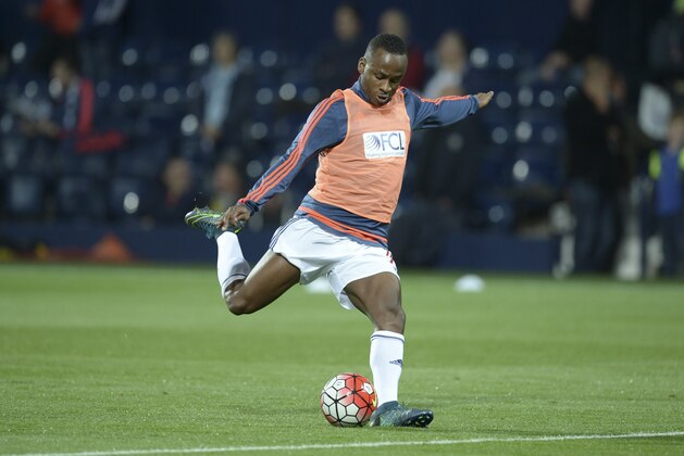 West Bromwich Albion's Burundian-born English striker Saido Berahino warms up before the English Premier League football match between West Bromwich Albion and Everton at The Hawthorns in West Bromwich, central England, on September 28, 2015.  AFP PHOTO / OLI SCARFF

RESTRICTED TO EDITORIAL USE. No use with unauthorized audio, video, data, fixture lists, club/league logos or 'live' services. Online in-match use limited to 75 images, no video emulation. No use in betting, games or single club/league/player publications.        (Photo credit should read OLI SCARFF/AFP/Getty Images)