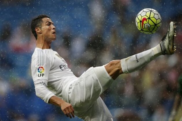 Real Madrid's Cristiano Ronaldo kicks the ball during a Spanish La Liga soccer match between Real Madrid and Levante at the Santiago Bernabeu stadium in Madrid, Spain, Saturday, Oct. 17, 2015. (AP Photo/Daniel Ochoa de Olza)