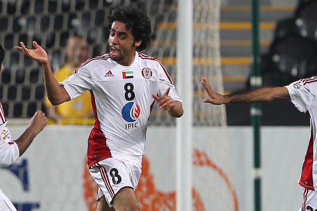 Abdullah Qassem (C) of UAE's Al-Jazira celebrates with his teammates after scoring his team's second goal against Saudi Arabia's Al-Hilal during their AFC Champions League group A football match at Al-Jazira Stadium in Abu Dhabi on April 20, 2011. AFP PHOTO/JOSEPH CAPELLAN (Photo credit should read JOSEPH CAPELLAN/AFP/Getty Images)