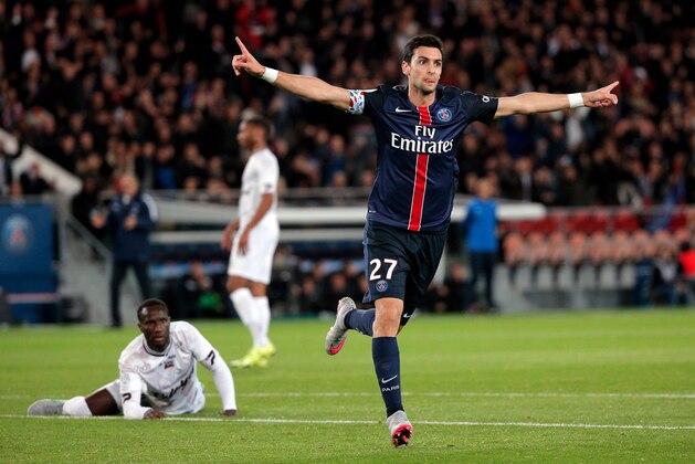 PSG's Javier Pastore celebrates after scoring during his French League One soccer match against Guingamp, at the Parc des Princes stadium in Paris, France, Tuesday, Sept. 22, 2015. (AP Photo/Thibault Camus)