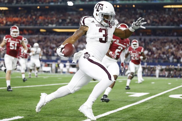 Sep 26, 2015; Arlington, TX, USA; Texas A&M Aggies receiver Christian Kirk (3) runs after a reception in the second quarter against the Arkansas Razorbacks at AT&T Stadium. Mandatory Credit: Matthew Emmons-USA TODAY Sports