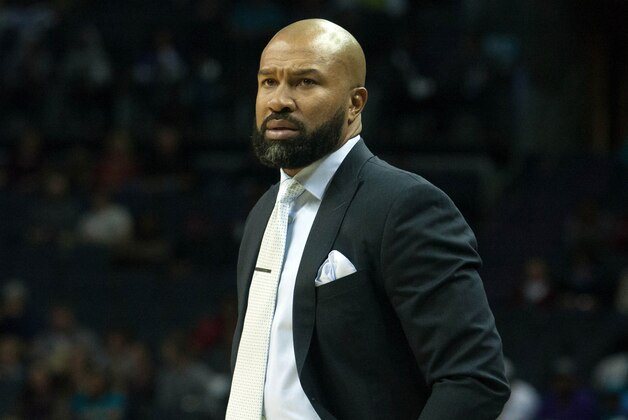 Oct 17, 2015; Charlotte, NC, USA; New York Knicks head coach Derek Fisher looks on during the first half against the Charlotte Hornets at Time Warner Cable Arena. Mandatory Credit: Jeremy Brevard-USA TODAY Sports