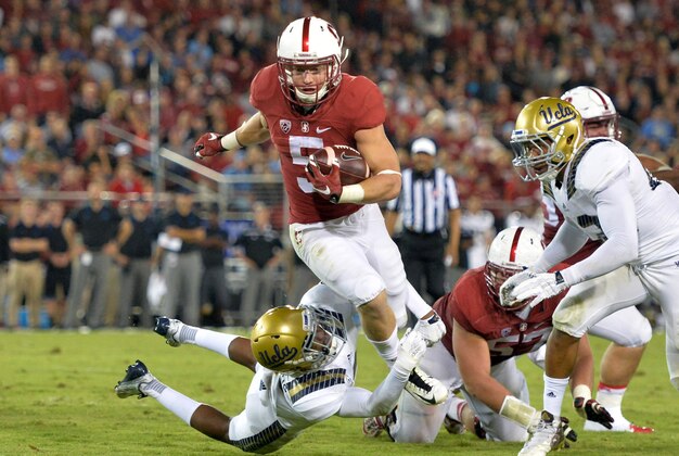 Oct 15, 2015; Stanford, CA, USA; Stanford Cardinal running back Christian McCaffrey (5) carries the ball in the second quarter against the UCLA Bruins in a NCAA football game at Stanford Stadium. Mandatory Credit: Kirby Lee-USA TODAY Sports