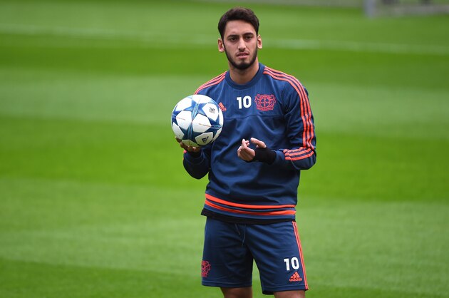 Leverkusen's midfielder Hakan Calhanoglu takes part in a training session on the eve of the Group E, first-leg UEFA Champions League football match Bayer Leverkusen vs AS Roma in Leverkusen, western Germany on October 19, 2015. AFP PHOTO / PATRIK STOLLARZ        (Photo credit should read PATRIK STOLLARZ/AFP/Getty Images)