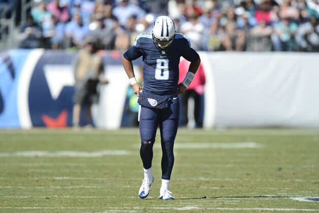 Tennessee Titans quarterback Marcus Mariota walks down the field in the first half of an NFL football game against the Miami Dolphins Sunday, Oct. 18, 2015, in Nashville, Tenn. The Dolphins won 38-10. (AP Photo/Mark Zaleski)