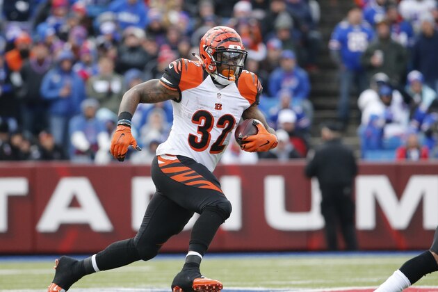 Cincinnati Bengals running back Jeremy Hill (32) carries the ball against the Buffalo Bills during the second half of an NFL football game on Sunday, Oct. 18, 2015, in Orchard Park, N.Y. (AP Photo/Bill Wippert)
