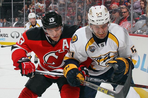NEWARK, NJ - OCTOBER 13: Mike Cammalleri #13 of the New Jersey Devils checks Roman Josi #59 of the Nashville Predators at the Prudential Center on October 13, 2015 in Newark, New Jersey.  (Photo by Bruce Bennett/Getty Images)
