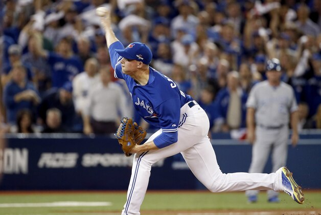 Toronto Blue Jays relief pitcher Aaron Sanchez throws against the Kansas City Royals during the seventh inning in Game 3 of baseball's American League Championship Series on Monday, Oct. 19, 2015, in Toronto. (AP Photo/Matt Slocum)