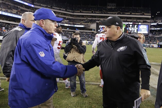 New York Giants head coach Tom Coughlin, left, and Philadelphia Eagles head coach Chip Kelly talk after an NFL football game, Monday, Oct. 19, 2015, in Philadelphia. The Eagles won 27-7. (AP Photo/Matt Rourke)