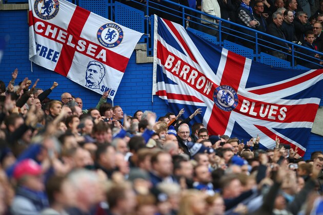 LONDON, ENGLAND - OCTOBER 17: Chelsea supporters cheer prior to the Barclays Premier League match between Chelsea and Aston Villa at Stamford Bridge on October 17, 2015 in London, England.  (Photo by Clive Rose/Getty Images)