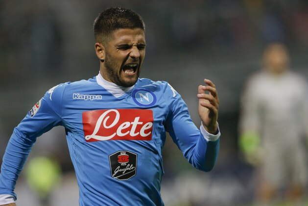 Napoli’s Lorenzo Insigne celebrates after scoring during a Serie A soccer match between AC Milan and Napoli, at the San Siro stadium in Milan, Italy, Sunday, Oct. 4, 2015. (AP Photo/Luca Bruno)