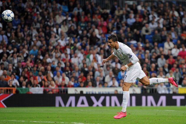 MADRID, SPAIN - SEPTEMBER 15:  Cristiano Ronaldo of Real Madrid scores Real's 4th goal during the UEFA Champions League Group A match between Real Madrid and Shakhtar Donetsk at estadio Santiago Bernabeu on September 15, 2015 in Madrid, Spain.  (Photo by Denis Doyle/Getty Images)
