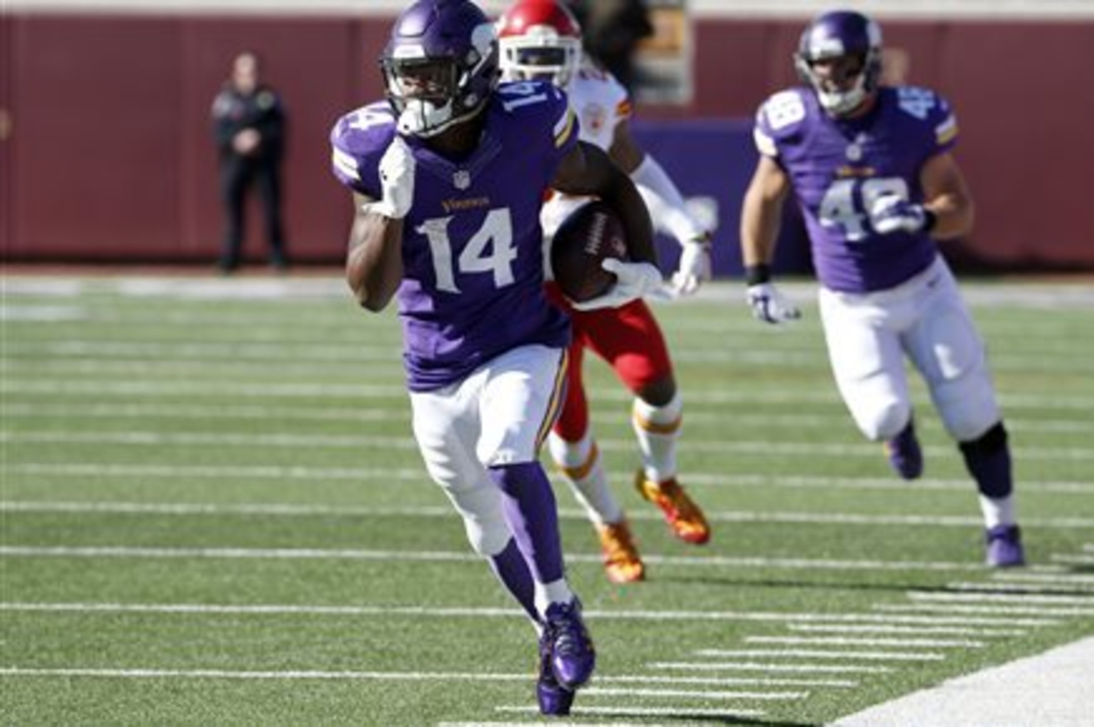 FILE - In this Oct. 18, 2015, file photo, Minnesota Vikings wide receiver Stefon Diggs (14) runs with the ball during the first half of an NFL football game against the Kansas City Chiefs, in Minneapolis. Few knew who Stefon Diggs was when the Vikings grabbed the receiver in the fifth round of the draft. After Sunday's seven-catch, 129-yard performance, coaches, opposing defenses and fantasy owners are going to start taking notice.  (AP Photo/Ann Heisenfelt, File)