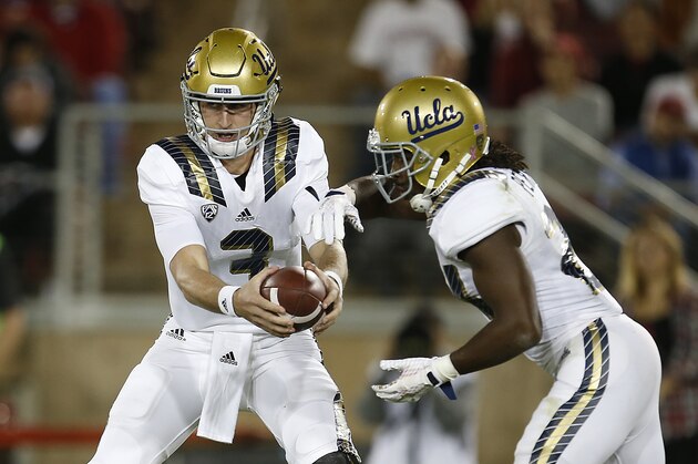 UCLA quarterback Josh Rosen (3) hands off to running back Paul Perkins (24) during the first half of an NCAA college football game Thursday, Oct. 15, 2015, Stanford, Calif. (AP Photo/Tony Avelar)