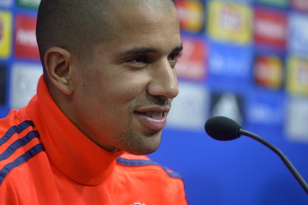 Valencia's French midfielder Sofiane Feghouli smiles during a press conference at the Valencia's Sport City in Valencia on October 19, 2015, on the eve of the UEFA Champions League group H match Valencia CF vs KAA Gent.   AFP PHOTO/ JOSE JORDAN        (Photo credit should read JOSE JORDAN/AFP/Getty Images)