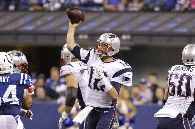 New England Patriots quarterback Tom Brady throws in the second half of an NFL football game against the Indianapolis Colts in Indianapolis, Sunday, Oct. 18, 2015.  (AP Photo/John Minchillo)