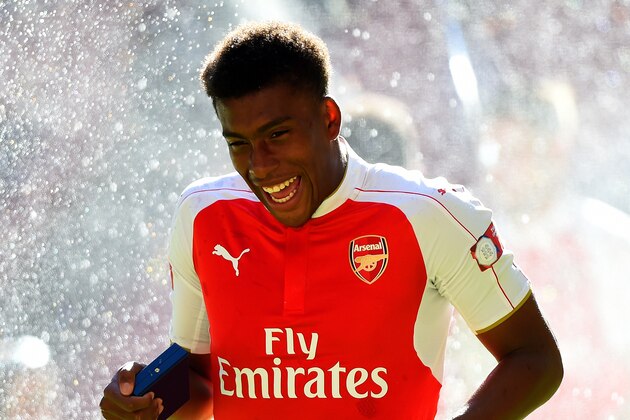 LONDON, ENGLAND - AUGUST 02:  Alex Iwobi of Arsenal celebrates his team's 1-0 win in the FA Community Shield match between Chelsea and Arsenal at Wembley Stadium on August 2, 2015 in London, England.  (Photo by Mike Hewitt/Getty Images)