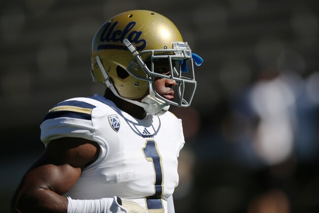 UCLA defensive back Ishmael Adams warms up before facing Colorado in the first quarter of an NCAA football game in Boulder, Colo., on Saturday, Oct. 25, 2014. (AP Photo/David Zalubowski)