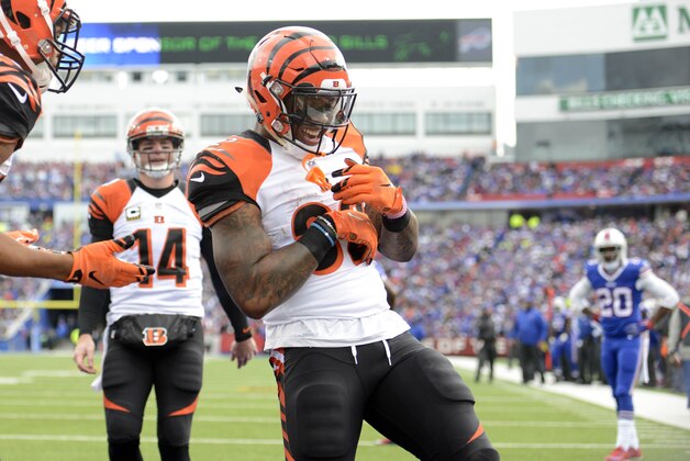 Cincinnati Bengals running back Jeremy Hill (32) celebrates his touchdown during the first half of an NFL football game against the Buffalo Bills on Sunday, Oct. 18, 2015, in Orchard Park, N.Y. (AP Photo/Gary Wiepert)