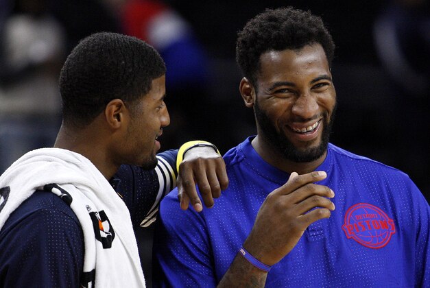 Oct 6, 2015; Auburn Hills, MI, USA; Detroit Pistons center Andre Drummond (right) and Indiana Pacers forward Paul George (left) share a laugh after the game at The Palace of Auburn Hills. Pacers win 115-112. Mandatory Credit: Raj Mehta-USA TODAY Sports