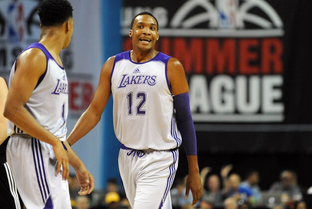 Jul 10, 2015; Las Vegas, NV, USA; Los Angeles Lakers center Robert Upshaw (12) reacts after a call during an NBA Summer League game against Minnesota at Thomas & Mack Center. Minnesota won the game 81-68.  Mandatory Credit: Stephen R. Sylvanie-USA TODAY Sports