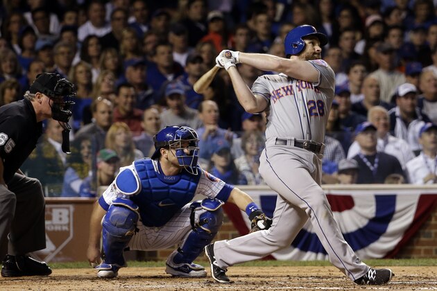 New York Mets' Daniel Murphy hits a home run during the third inning of Game 3 of the National League baseball championship series against the Chicago Cubs Tuesday, Oct. 20, 2015, in Chicago. (AP Photo/David J. Phillip)