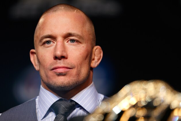 LAS VEGAS, NV - NOVEMBER 14: UFC welterweight champion Georges St-Pierre interacts with media during the final UFC 167 pre-fight press conference inside the Hollywood Theatre at the MGM Grand Hotel/Casino on November 14, 2013 in Las Vegas, Nevada. (Photo by Josh Hedges/Zuffa LLC/Zuffa LLC via Getty Images)