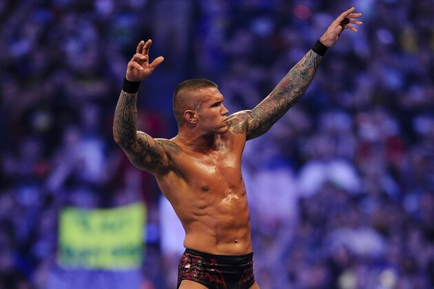 FILE- In this Sunday, April 3, 2011 file photo, WWE Superstar Randy Orton celebrates defeating CM Punk (not pictured) during WrestleMania XXVII at the Georgia Dome in Atlanta, Georgia on. World-famous WWE wrestlers such as John Cena, Shaemus and champion Randy Orton are in Saudi Arabia for three days of matches in the capital Riyadh. (Paul Abell/AP Images for WWE, File)