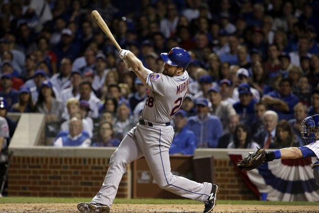 New York Mets' Daniel Murphy hits a home run during the third inning of Game 3 of the National League baseball championship series against the Chicago Cubs Tuesday, Oct. 20, 2015, in Chicago. (AP Photo/Nam Y. Huh)